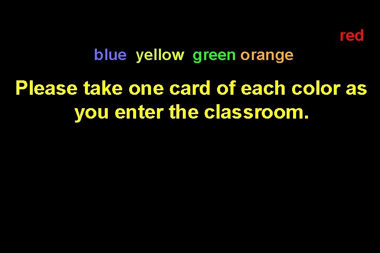 at the front of the classroom are stacks of red , blue, yellow, green
