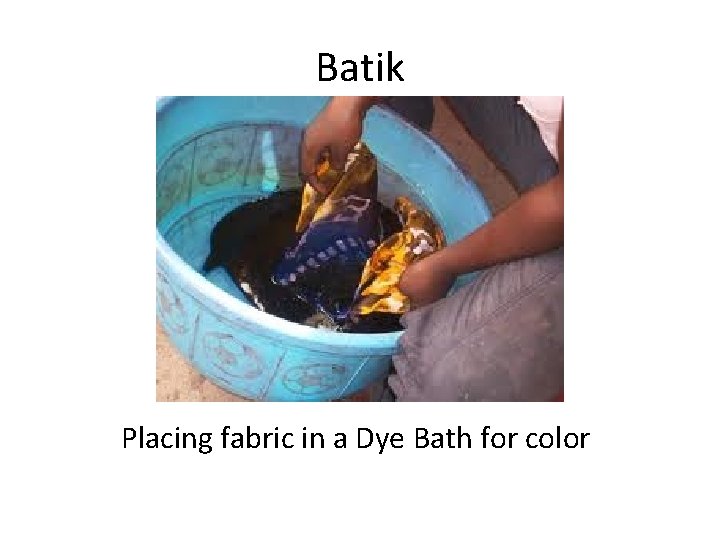 Batik Placing fabric in a Dye Bath for color 