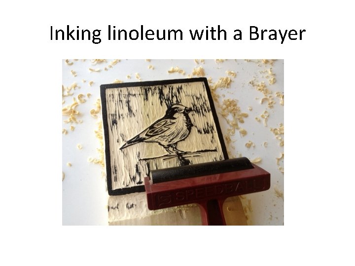 Inking linoleum with a Brayer 
