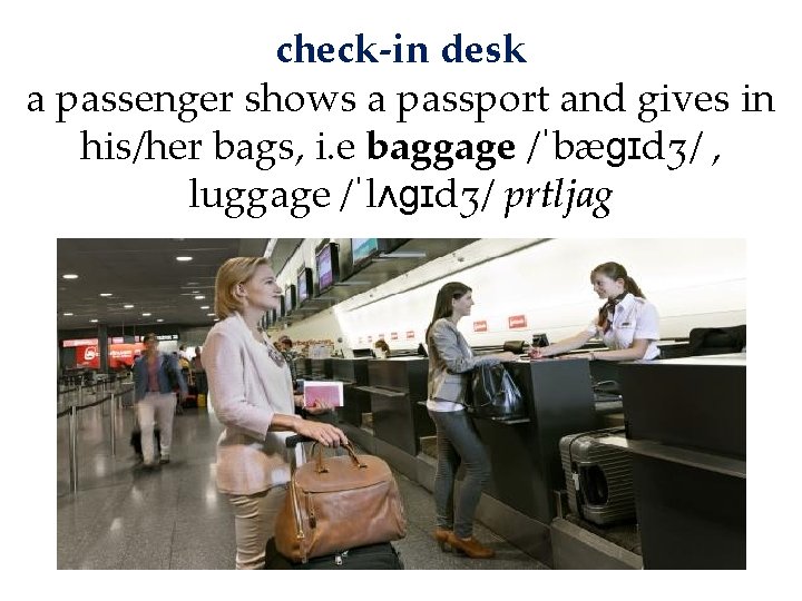 check-in desk a passenger shows a passport and gives in his/her bags, i. e