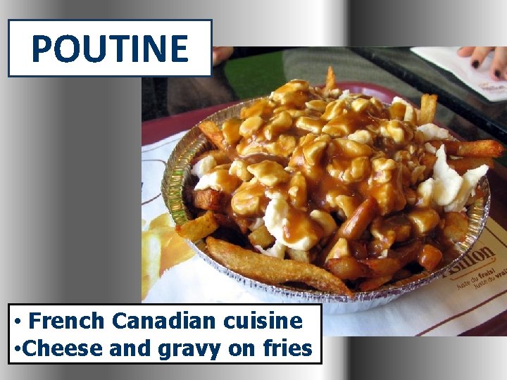 POUTINE • French Canadian cuisine • Cheese and gravy on fries 