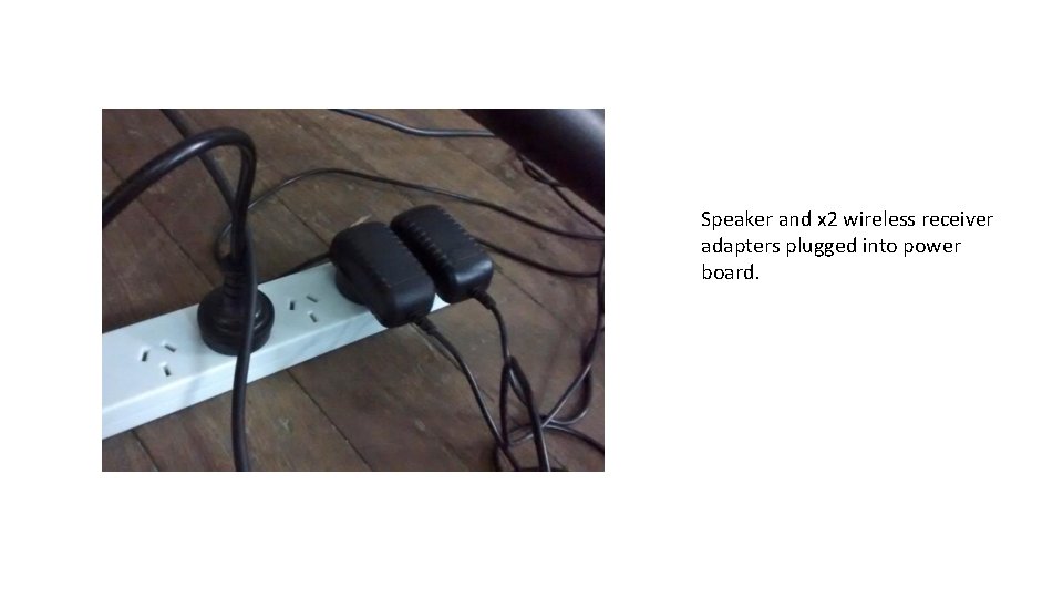 Speaker and x 2 wireless receiver adapters plugged into power board. 