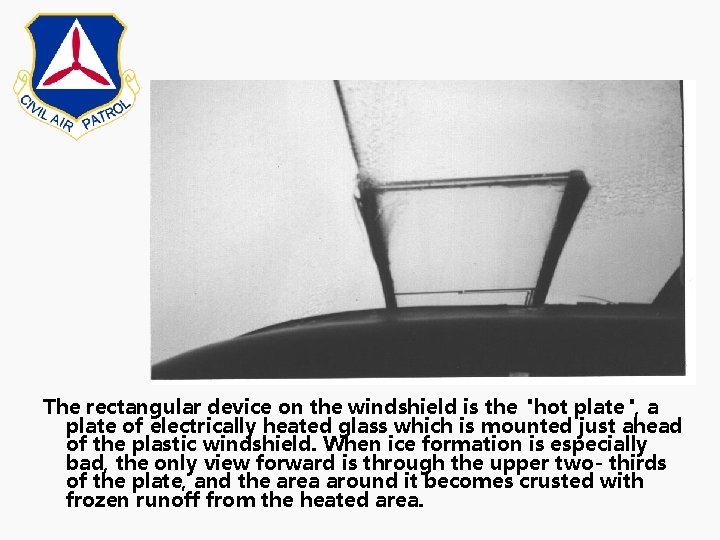 The rectangular device on the windshield is the "hot plate", a plate of electrically