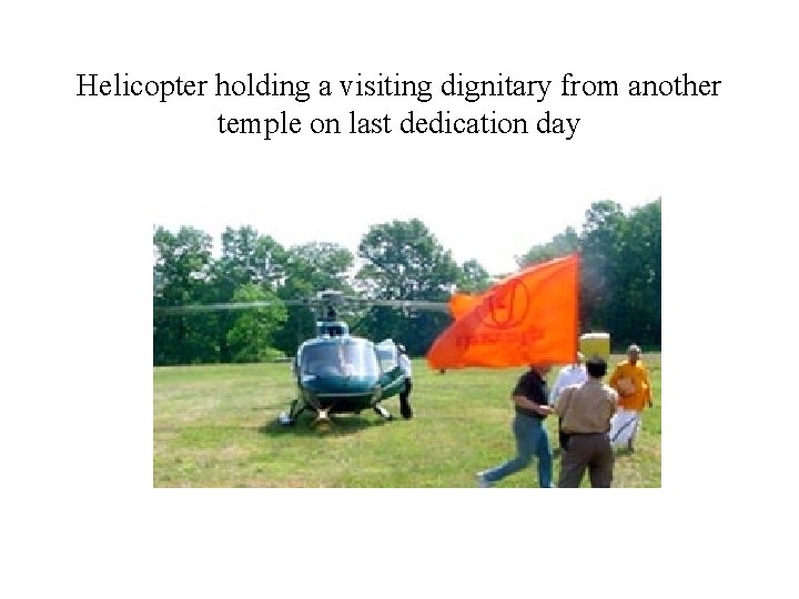Helicopter holding a visiting dignitary from another temple on last dedication day 