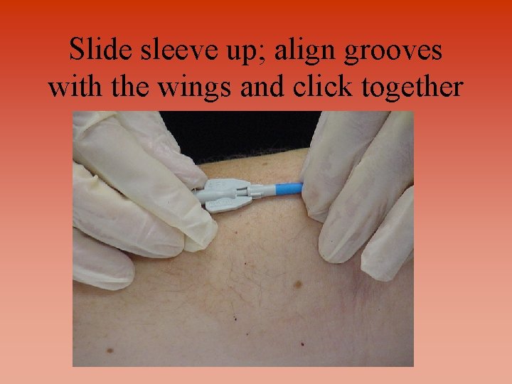 Slide sleeve up; align grooves with the wings and click together 