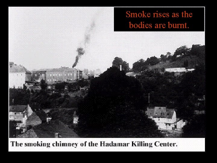 Smoke rises as the bodies are burnt. 