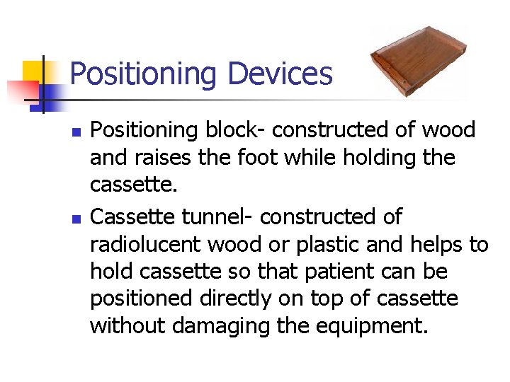 Positioning Devices n n Positioning block- constructed of wood and raises the foot while