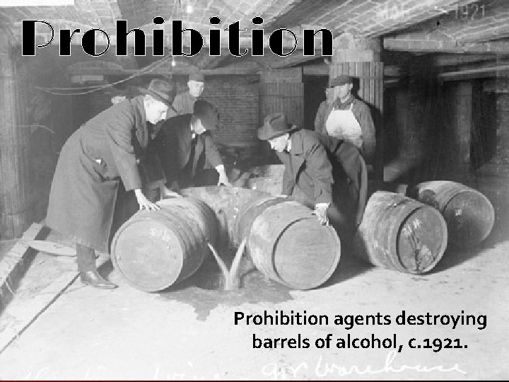 Prohibition agents destroying barrels of alcohol, c. 1921. 
