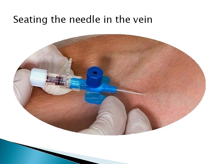 Seating the needle in the vein 