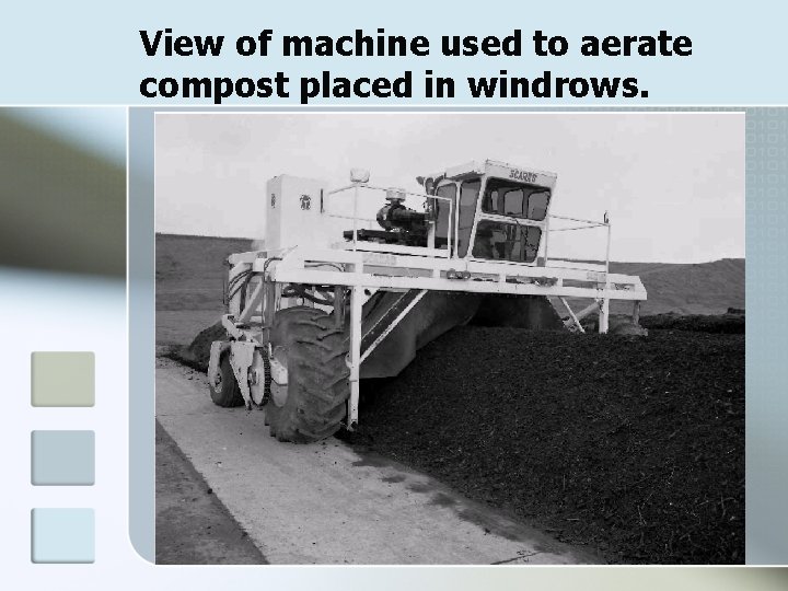 View of machine used to aerate compost placed in windrows. 