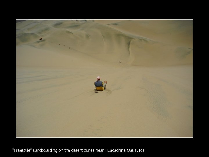 “Freestyle” sandboarding on the desert dunes near Huacachina Oasis, Ica 