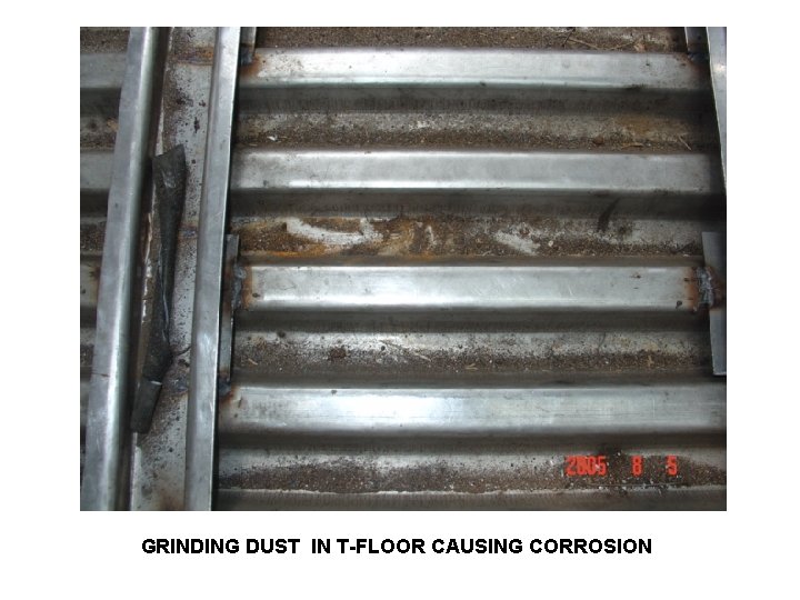 GRINDING DUST IN T-FLOOR CAUSING CORROSION 