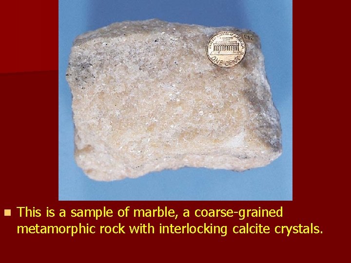 n This is a sample of marble, a coarse-grained metamorphic rock with interlocking calcite n This is a sample of marble, a coarse-grained metamorphic rock with interlocking calcite