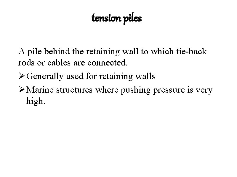 tension piles A pile behind the retaining wall to which tie-back rods or cables