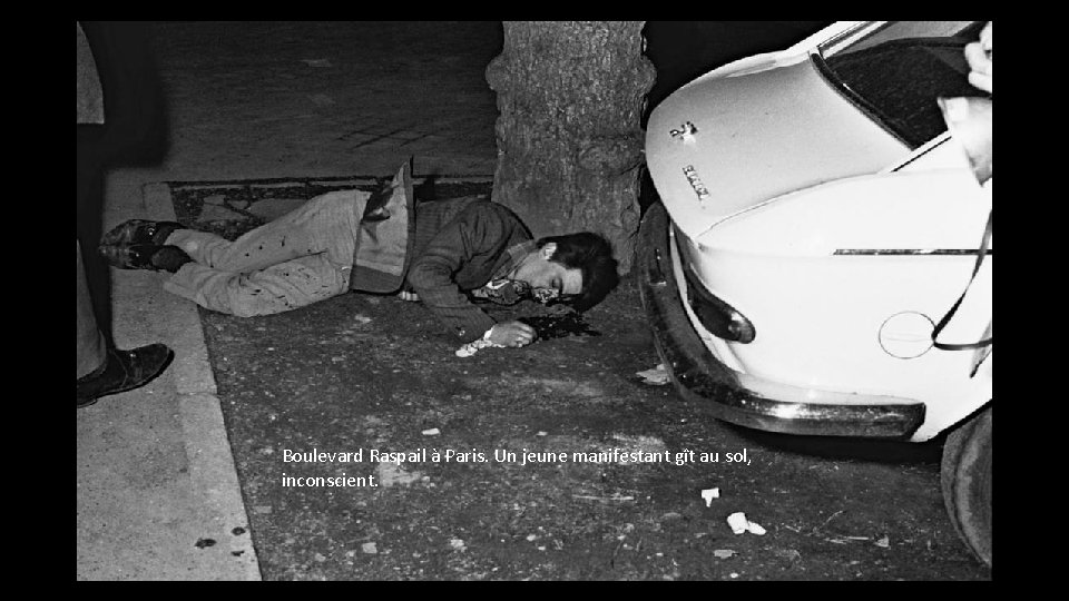 Boulevard Raspail à Paris. Un jeune manifestant gît au sol, inconscient. Boulevard Raspail à Paris. Un jeune manifestant gît au sol, inconscient.
