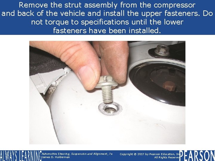 Remove the strut assembly from the compressor and back of the vehicle and install