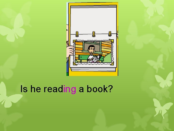 Is he reading a book? 