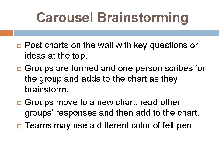 Carousel Brainstorming Post charts on the wall with key questions or ideas at the