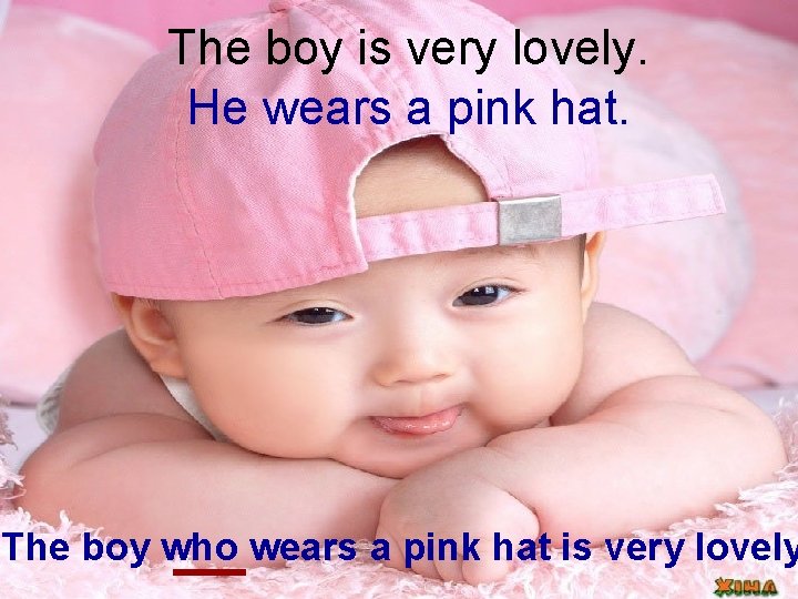 The boy is very lovely. He wears a pink hat. The boy who wears The boy is very lovely. He wears a pink hat. The boy who wears
