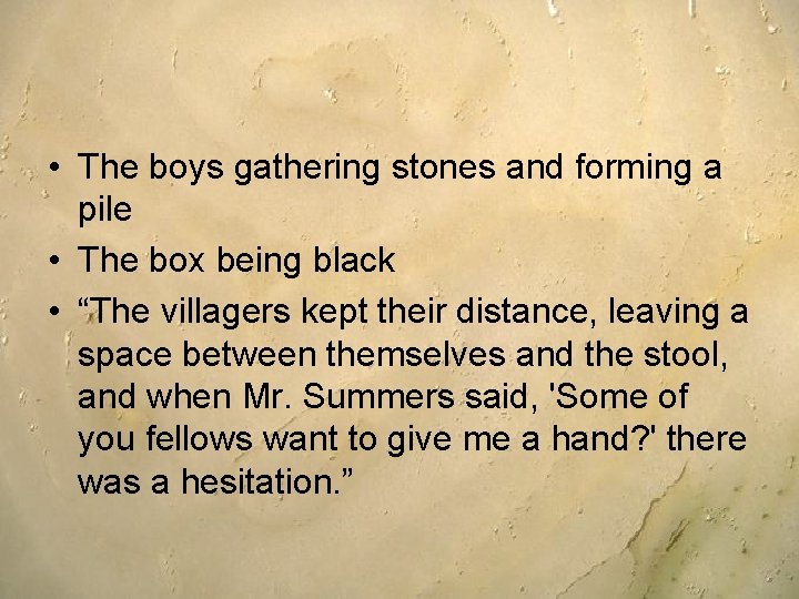  • The boys gathering stones and forming a pile • The box being