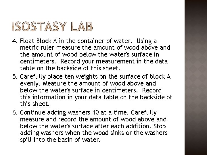 4. Float Block A in the container of water. Using a metric ruler measure