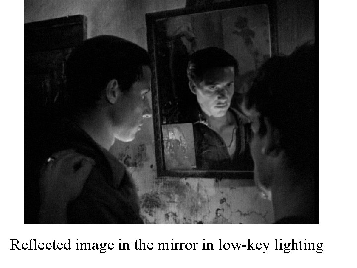 Reflected image in the mirror in low-key lighting 