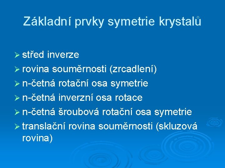 Základní prvky symetrie krystalů Ø střed inverze Ø rovina souměrnosti (zrcadlení) Ø n-četná rotační