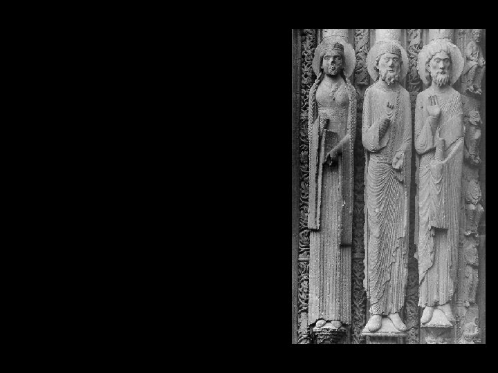 Old Testament queen and two kings jamb statues, doorway of Royal Portal Chartres Cathedral