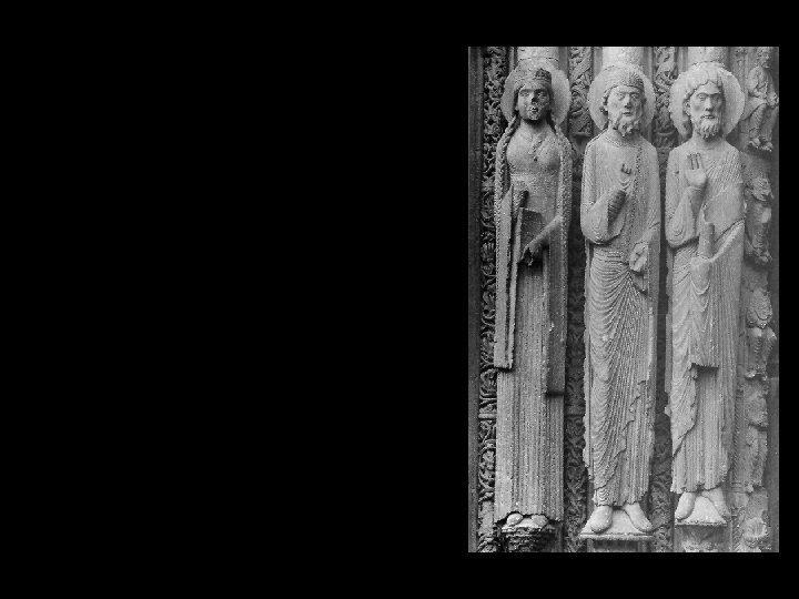 Old Testament queen and two kings jamb statues, doorway of Royal Portal Chartres Cathedral