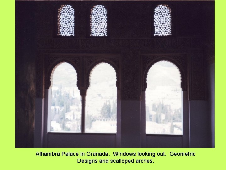 Alhambra Palace in Granada. Windows looking out. Geometric Designs and scalloped arches. 