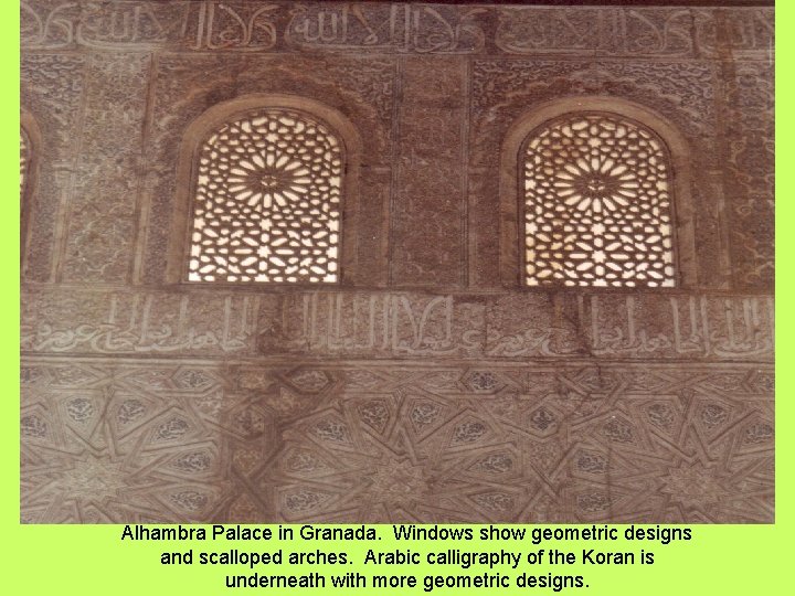 Alhambra Palace in Granada. Windows show geometric designs and scalloped arches. Arabic calligraphy of