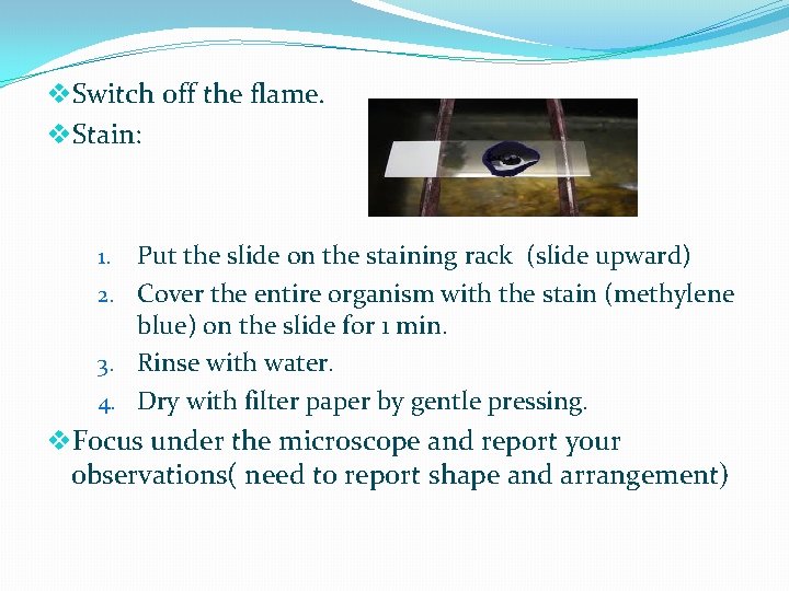 v. Switch off the flame. v. Stain: Put the slide on the staining rack