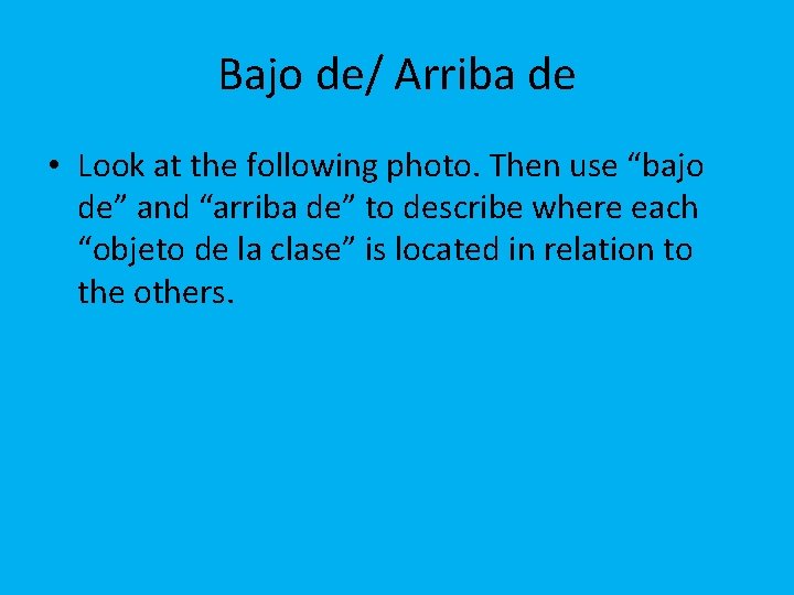 Bajo de/ Arriba de • Look at the following photo. Then use “bajo de”