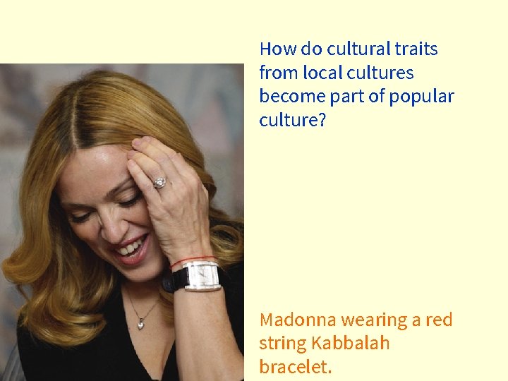 How do cultural traits from local cultures become part of popular culture? Madonna wearing