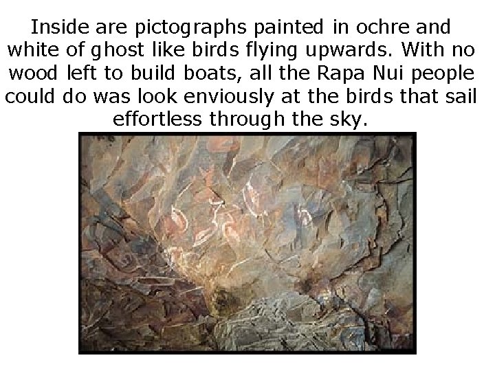 Inside are pictographs painted in ochre and white of ghost like birds flying upwards.