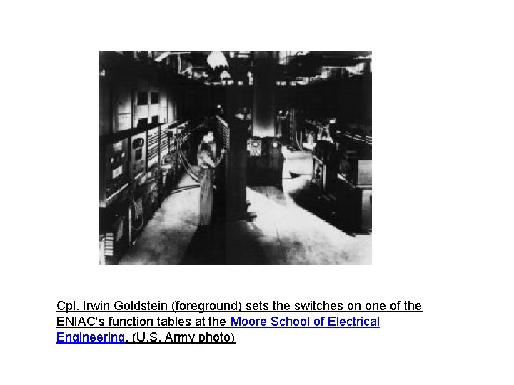 Cpl. Irwin Goldstein (foreground) sets the switches on one of the ENIAC's function tables