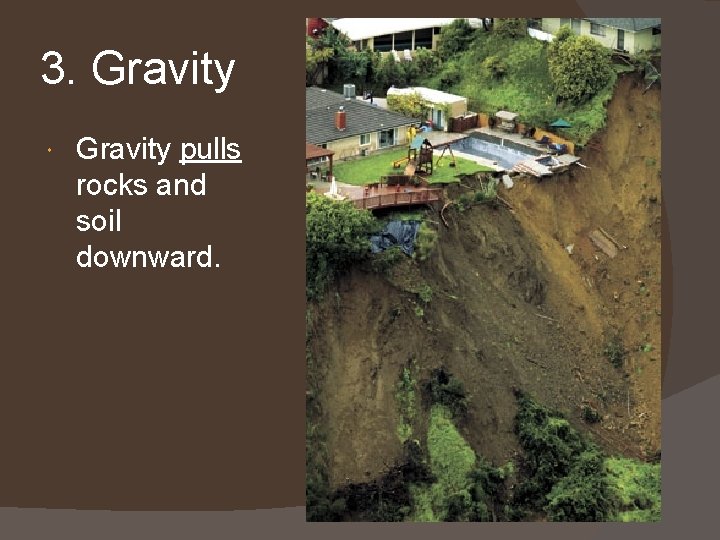 3. Gravity pulls rocks and soil downward. 