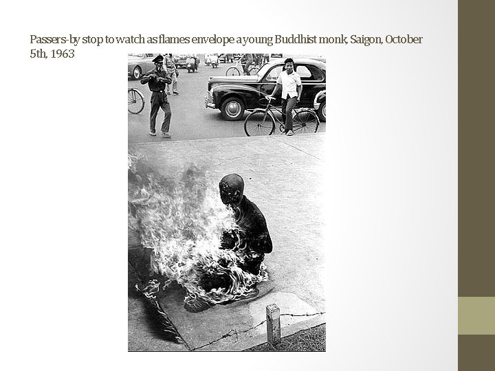 Passers-by stop to watch as flames envelope a young Buddhist monk, Saigon, October 5