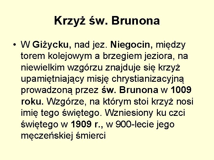 Krzyż św. Brunona • W Giżycku, nad jez. Niegocin, między torem kolejowym a brzegiem