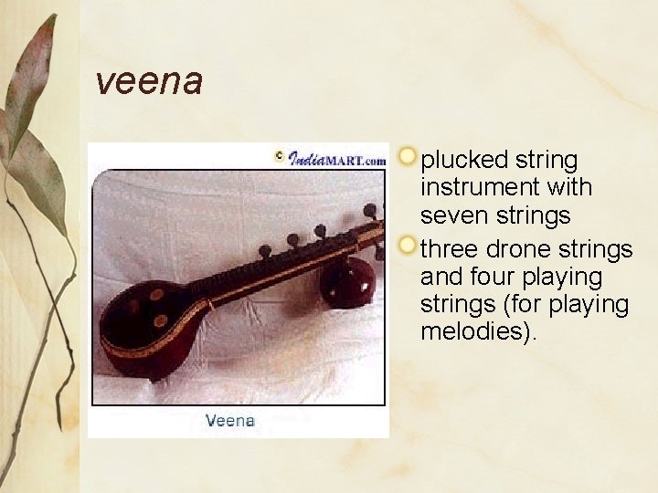 veena plucked string instrument with seven strings three drone strings and four playing strings