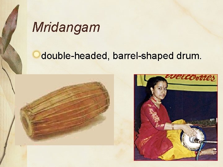 Mridangam double-headed, barrel-shaped drum. 
