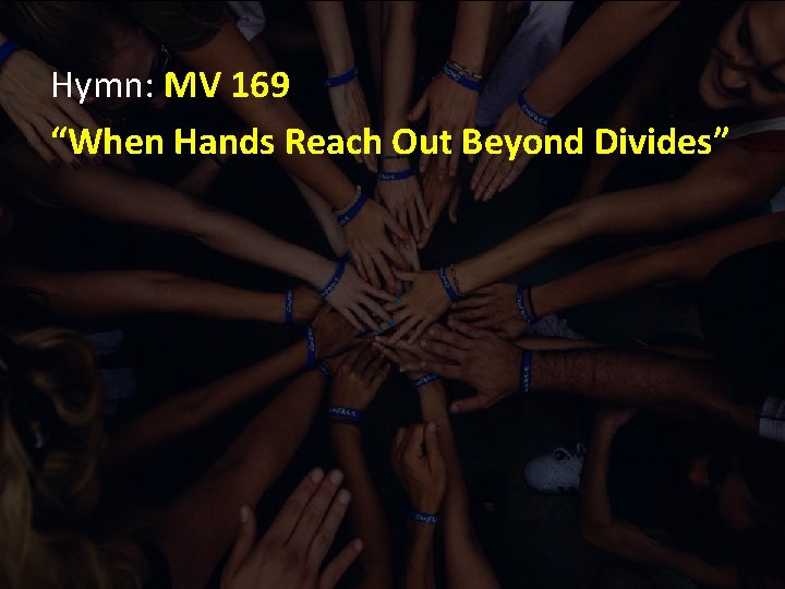 Hymn: MV 169 “When Hands Reach Out Beyond Divides” 