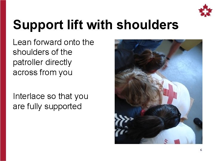 Support lift with shoulders Lean forward onto the shoulders of the patroller directly across