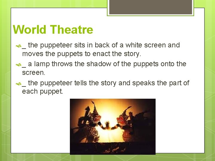 World Theatre _ the puppeteer sits in back of a white screen and moves