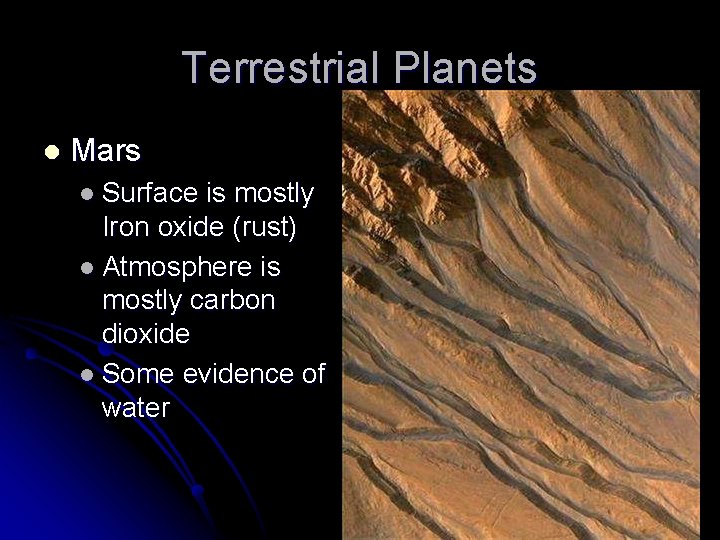 Terrestrial Planets l Mars l Surface is mostly Iron oxide (rust) l Atmosphere is