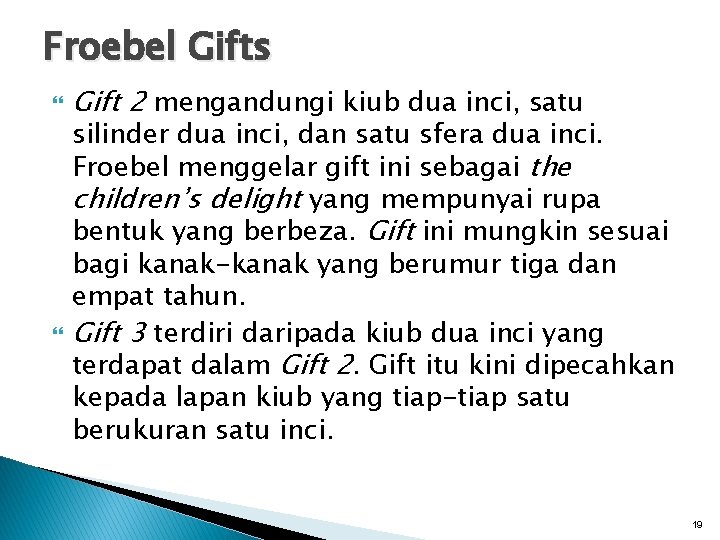 Froebel Gifts Gift 2 mengandungi kiub dua inci, satu silinder dua inci, dan satu