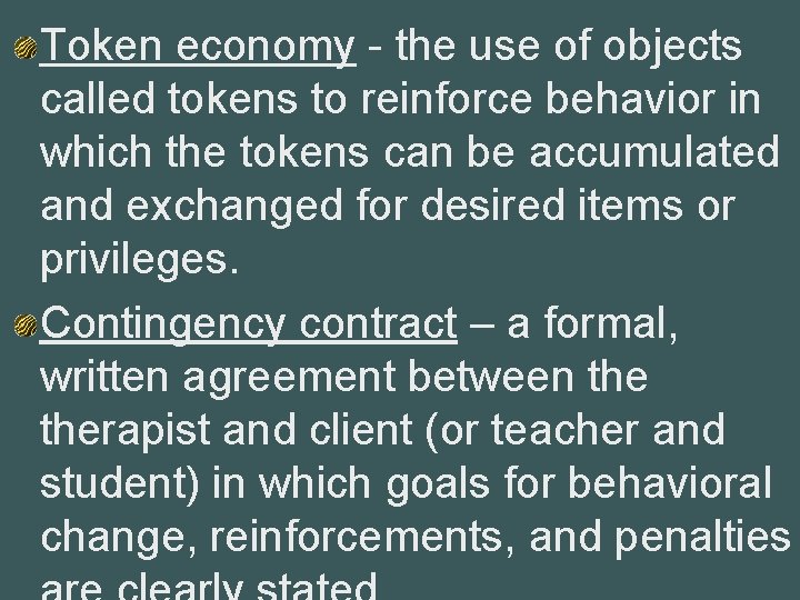 Token economy - the use of objects called tokens to reinforce behavior in which
