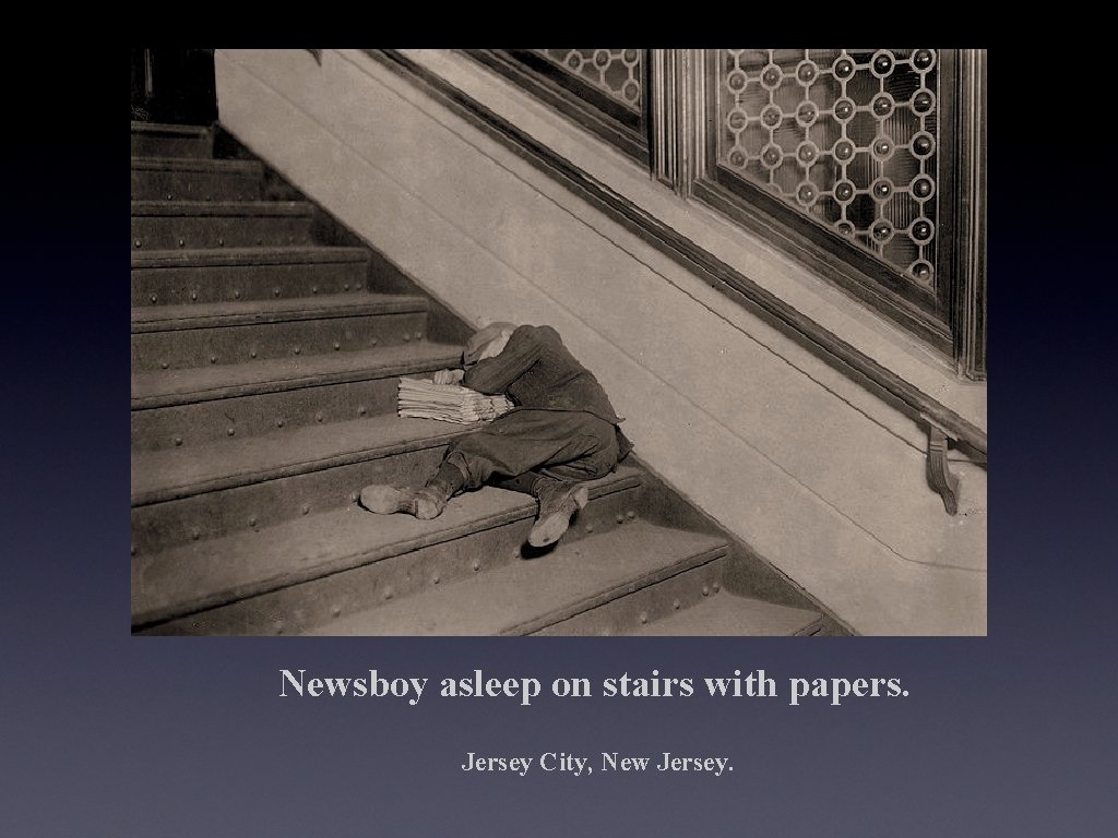 Newsboy asleep on stairs with papers. Jersey City, New Jersey. 