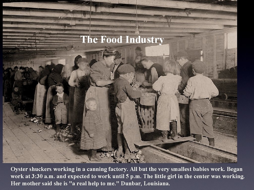 The Food Industry Oyster shuckers working in a canning factory. All but the very