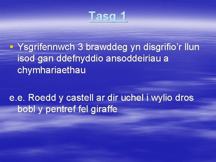 Tasg 1 § Ysgrifennwch 3 brawddeg yn disgrifio’r llun isod gan ddefnyddio ansoddeiriau a